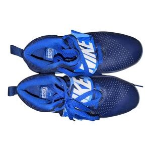 Nike Team Hustle Blue Sneakers with Mesh Upper and Streamlined Design